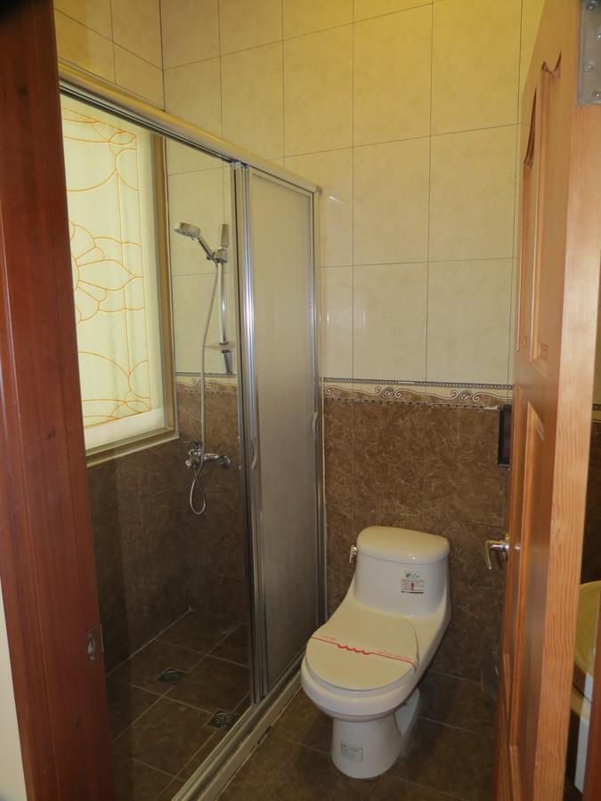 Seasons Inn Цзяоси Экстерьер фото